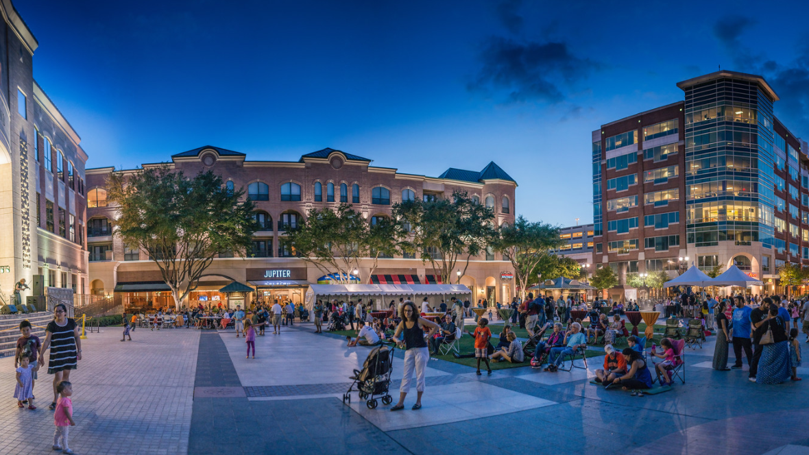 Photography of a busy Sugar Land Town Square event